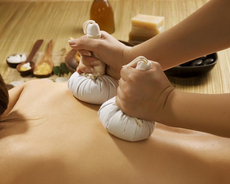 Kräuterstempel massage